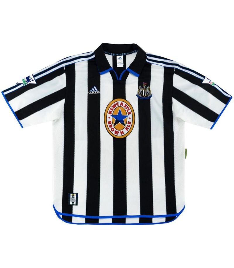 newcastle 1999 home kit in black and white stripes with blue outlined collar